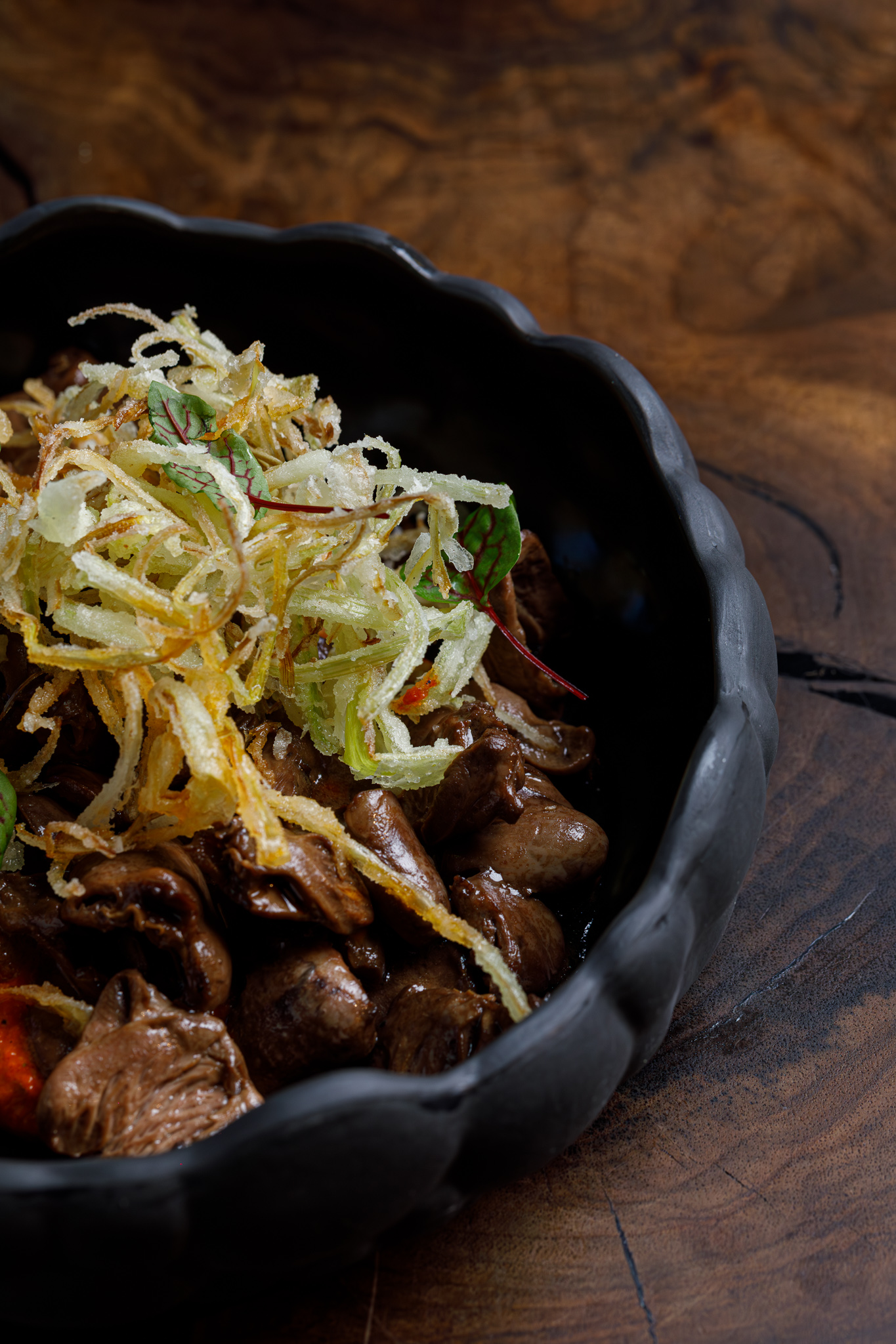 Pan seared chicken livers with crispy leeks